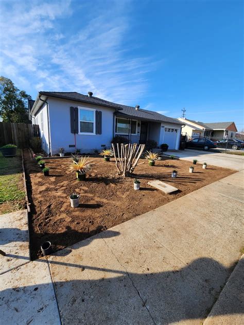 Front Yard Transformation with Chic White Gravel | Guerrero Landscaping Inc