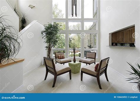 Living Room with Floor To Ceiling Windows Stock Photo - Image of ...