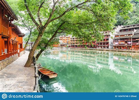 Parked Boat On The Tuojiang River Phoenix Ancient Town China Stock