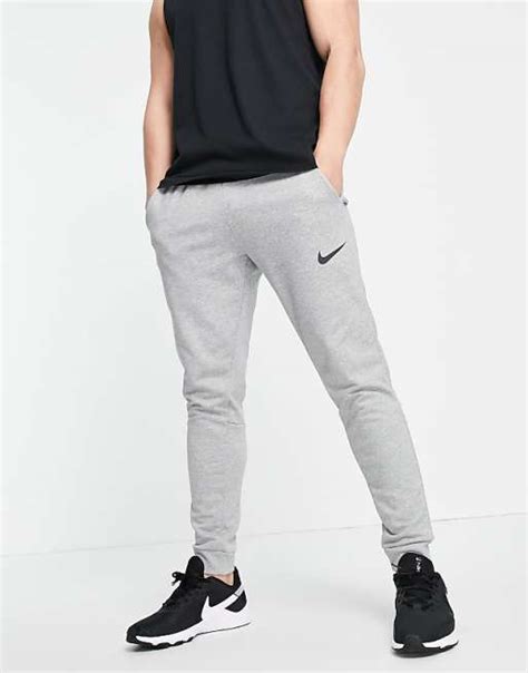 Nike Training Dri Fit Tapered Joggers In Light Grey Asos