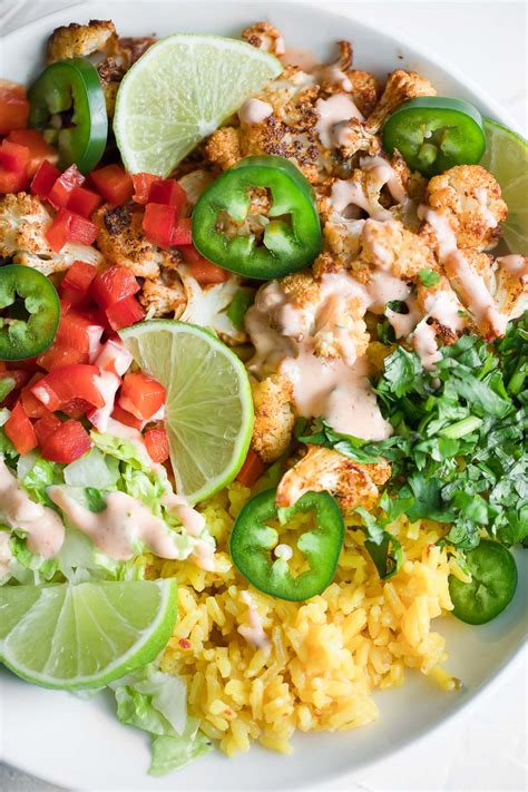 Vegetarian Burrito Bowls With Roasted Cauliflower Peas And Crayons