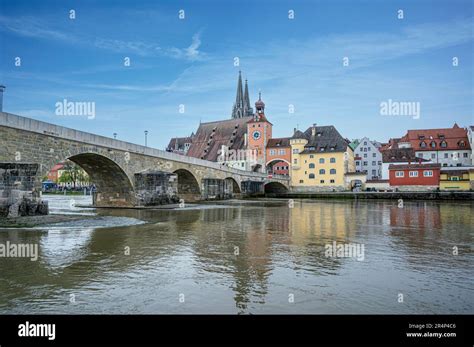 Old medieval stone bridge and historic old town in Regensburg, Germany ...