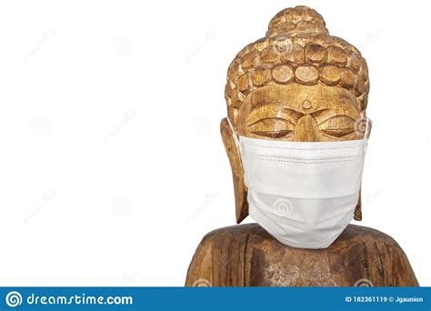 Estatua De Madera De Buddha Con Máscara Facial Imagen de archivo