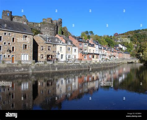 LA ROCHE EN ARDENNE, BELGIUM, OCTOBER 14 2017: View over the river Ourthe to the ruins of the ...