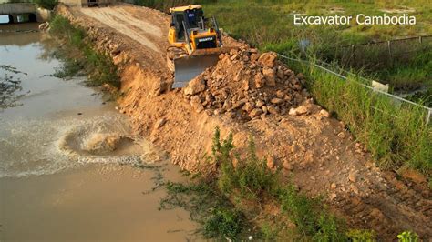 Great Bulldozer Clearing Forest Making Foundation Road And Dump Truck