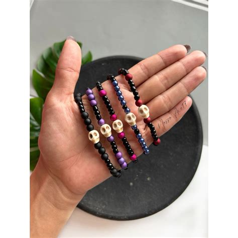 Pulseira Exu e Pombagira umbanda e candomblé caveira Shopee Brasil