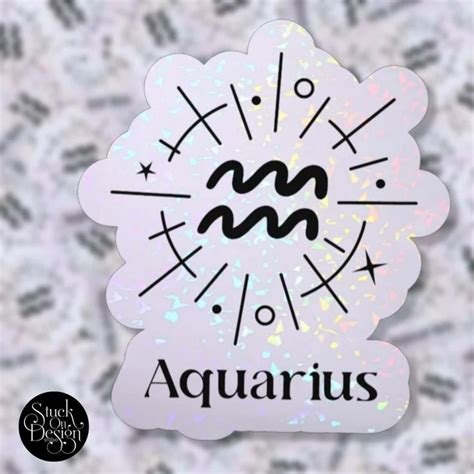 The Aquarius Sticker Is Shown Against A White Background With Black And