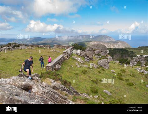 Beautiful galician landscape with tourists at day Stock Photo - Alamy