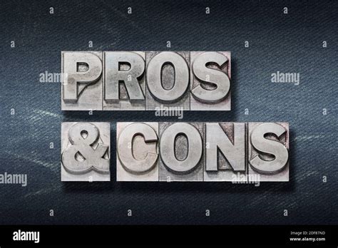 Pros And Cons Phrase Made From Metallic Letterpress On Dark Jeans