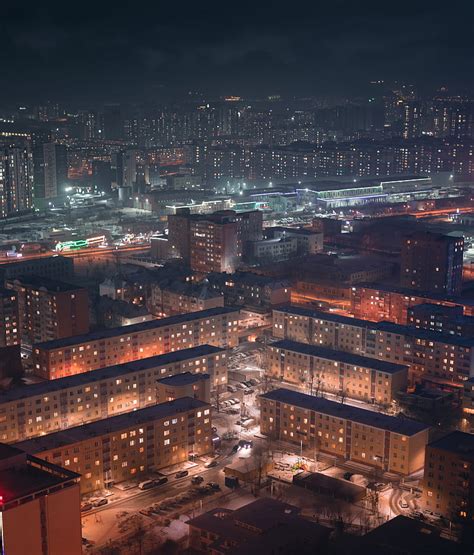 Aerial View Of City Buildings During Night Time Hd Phone Wallpaper