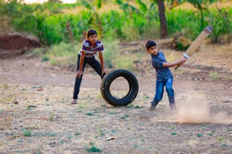 740+ Indian Kids Playing Cricket Stock Photos, Pictures & Royalty-Free ...