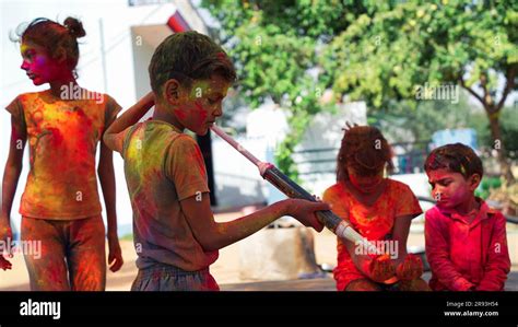 indian kids playing  colours  asian children celebrating holi