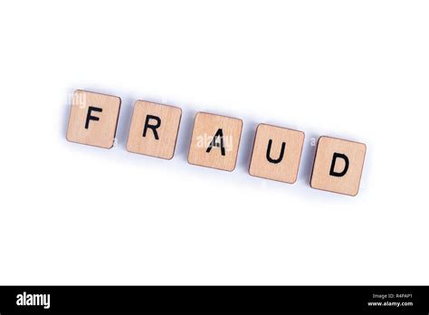 The Word Fraud Spelt With Wooden Tile Letters Stock Photo Alamy