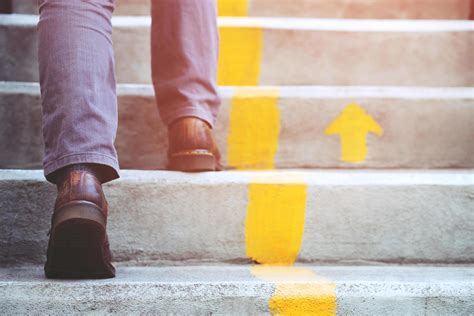 Business persons going up the stairs. 10585334 Stock Photo at Vecteezy