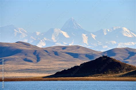 Khan Tengri Peak And Tuzkol Lake Khan Tengri Is A Mountain Of The Tian