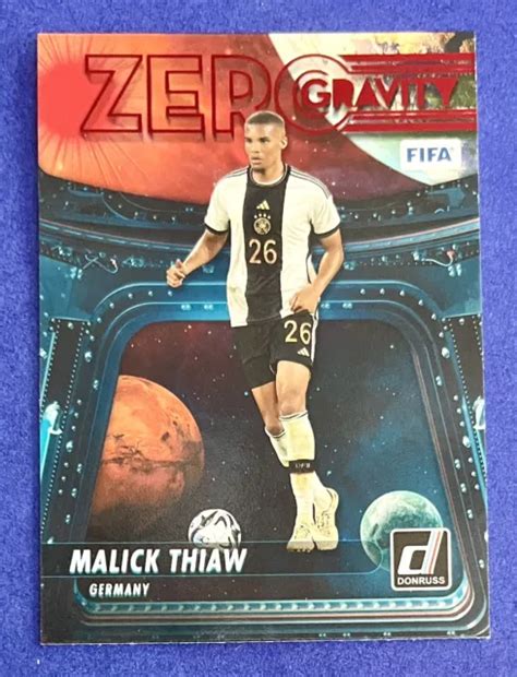 CARTE PARALLÈLE MALICK Thiaw 2023 24 Donruss FIFA ZÉRO GRAVITÉ ROUGE 3