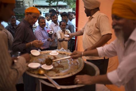 Centuries Old Sikh Tradition Keeps Homeless People In Britain Fed