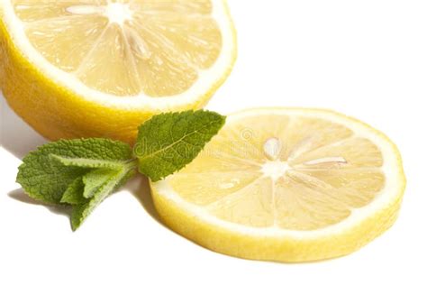 Delicious Lemons With Mint Leaves Isolated On White Background Stock