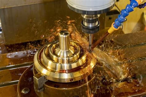 The Cnc Milling Machine Cutting The Shell Mold Parts With Oil Coolant