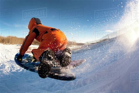 Person Tobogganing Stock Photo Dissolve