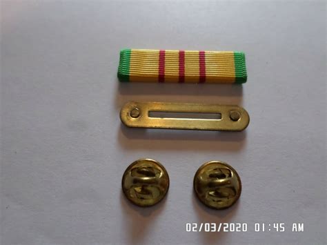 VIETNAM SERVICE RIBBON WITH RIBBON HOLDER U.S MILITARY VETERAN G.I ISS ...