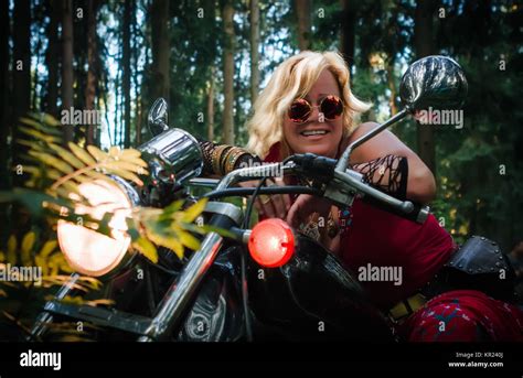 Mature Woman Sitting On Motorcycle Hi Res Stock Photography And Images