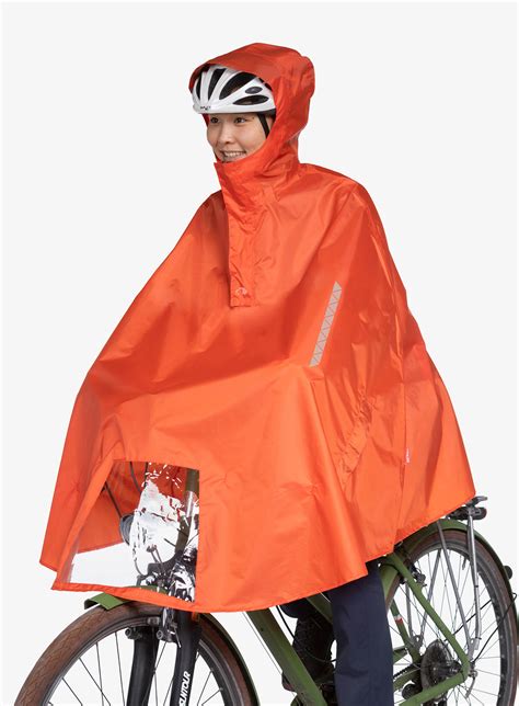 Nepromokavé pončo na kolo Tatonka Bike Poncho red orange