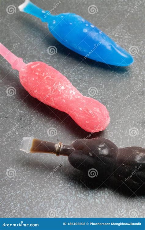 Colorful Syrup In A Frozen Doll Stock Photo Image Of Background