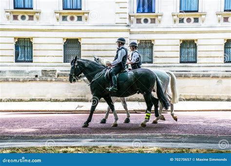 Police Officers On Horseback On Horse Guards Road London Editorial