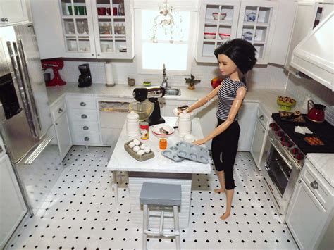 A Doll Is Standing In The Kitchen Preparing Food