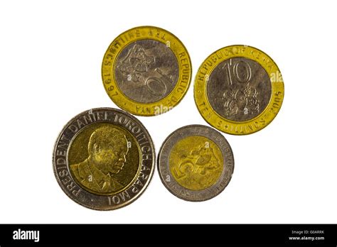 Four Metal Shillings Coins From Republic Of Kenya Stock Photo - Alamy