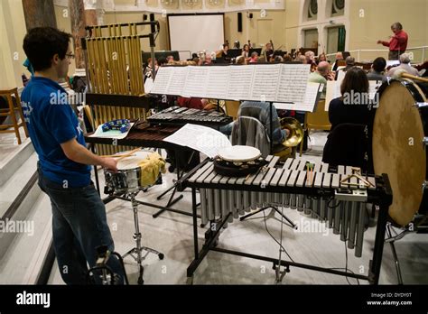 Percussion Section Members Of An Aberystwyth Philomusica Amateur Classical Music Orchestra