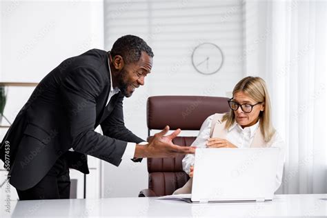 Angry African American Boss Scolds Woman Office Worker A Demanding