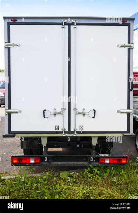 Rear view of new white cargo truck Stock Photo - Alamy