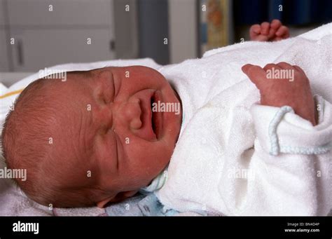 Newborn baby crying Stock Photo - Alamy