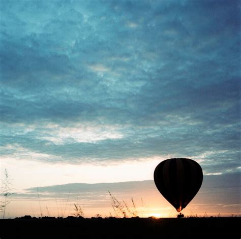 Premium Photo Silhouette Hot Air Balloon Against Cloudy Sky