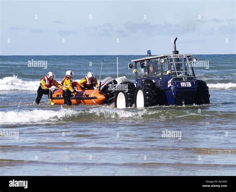 Royal National Lifeboat Institution Rnli Crew And Inshore Life Boat