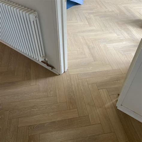 Dune Oak Herringbone 12mm Laminate Floor Depot