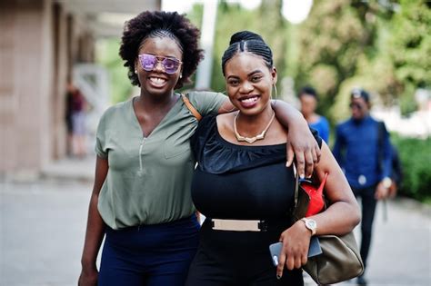 Free Photo Two African American Girls Walking And Posed At Street Of City