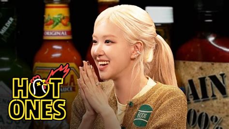 Blackpink s ROSÉ talks drinking games squeezes a stress ball while crushing Hot Ones Video