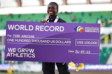 NIGERIAN TOBI AMUSAN GETS WORLD RECORD ON WILD NIGHT IN HURDLES Mon