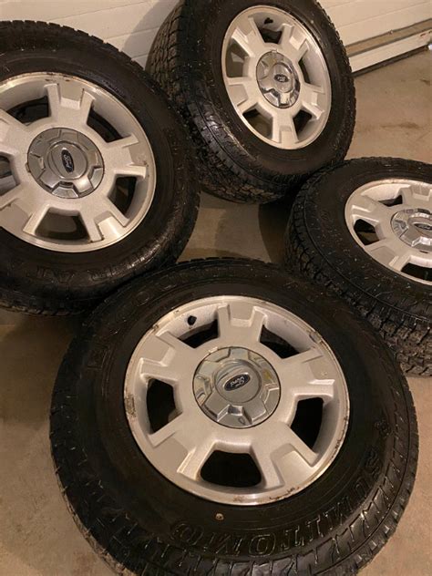 OEM factory Ford F150 17'' Rims and Tires 6x135 Snow Flake Rated | Tires & Rims | Winnipeg | Kijiji