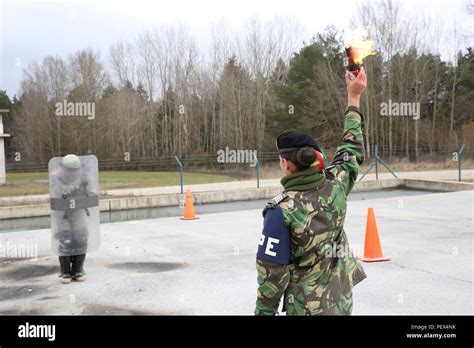 A Portuguese Soldier Of Portuguese Military Police Prepares To Throw A