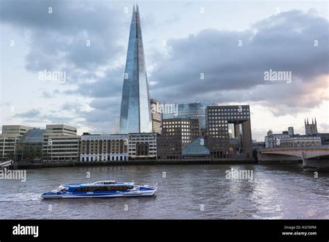 Sunset The Shard Skyscraper Flanked By London Bridge Hospital And The