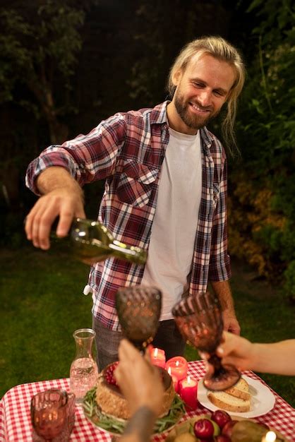 Premium Photo Medium Shot Smiley Man Pouring Drink