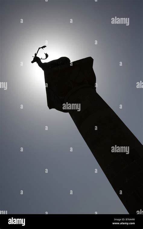 Silhouette Of Bronze Statue At The Entrance To Mandraki Harbour Rodos