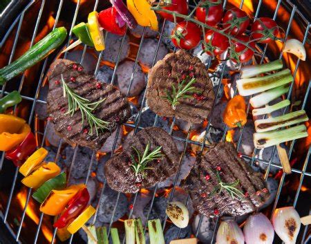 Barbecue Grill With Beef Steaks Close Up Stock Photo By Kesu