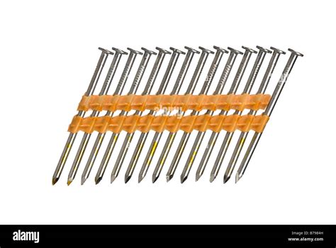 A Row Of Nail Gun Nails Isolated On A White Background Stock Photo Alamy