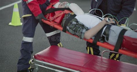 Accident Emergency And Hands Of People On Road For Injury First Aid