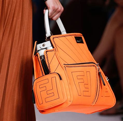 Fendis Spring 2019 Runway Bags Emphasize Utility Pockets And Embossed